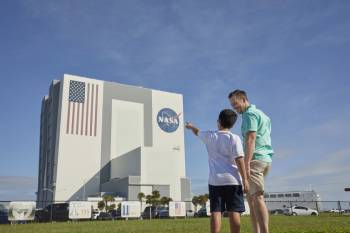 father and son at the Vehicle Assembly Building at Kennedy Space Center