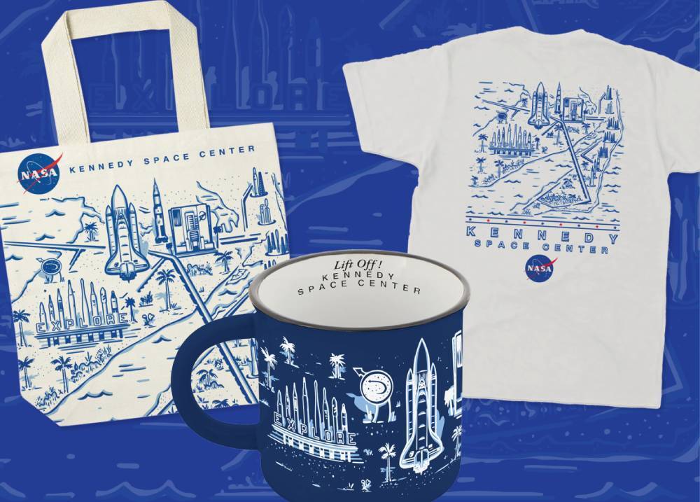 Tote bag, t-shirt, and mug with an artistic depictition of an aerial view of Kennedy Space Center